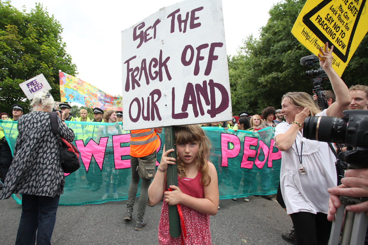 A young protester during an anti-fracking demonstration against the energy company Cuadrilla in Balcombe, UK.