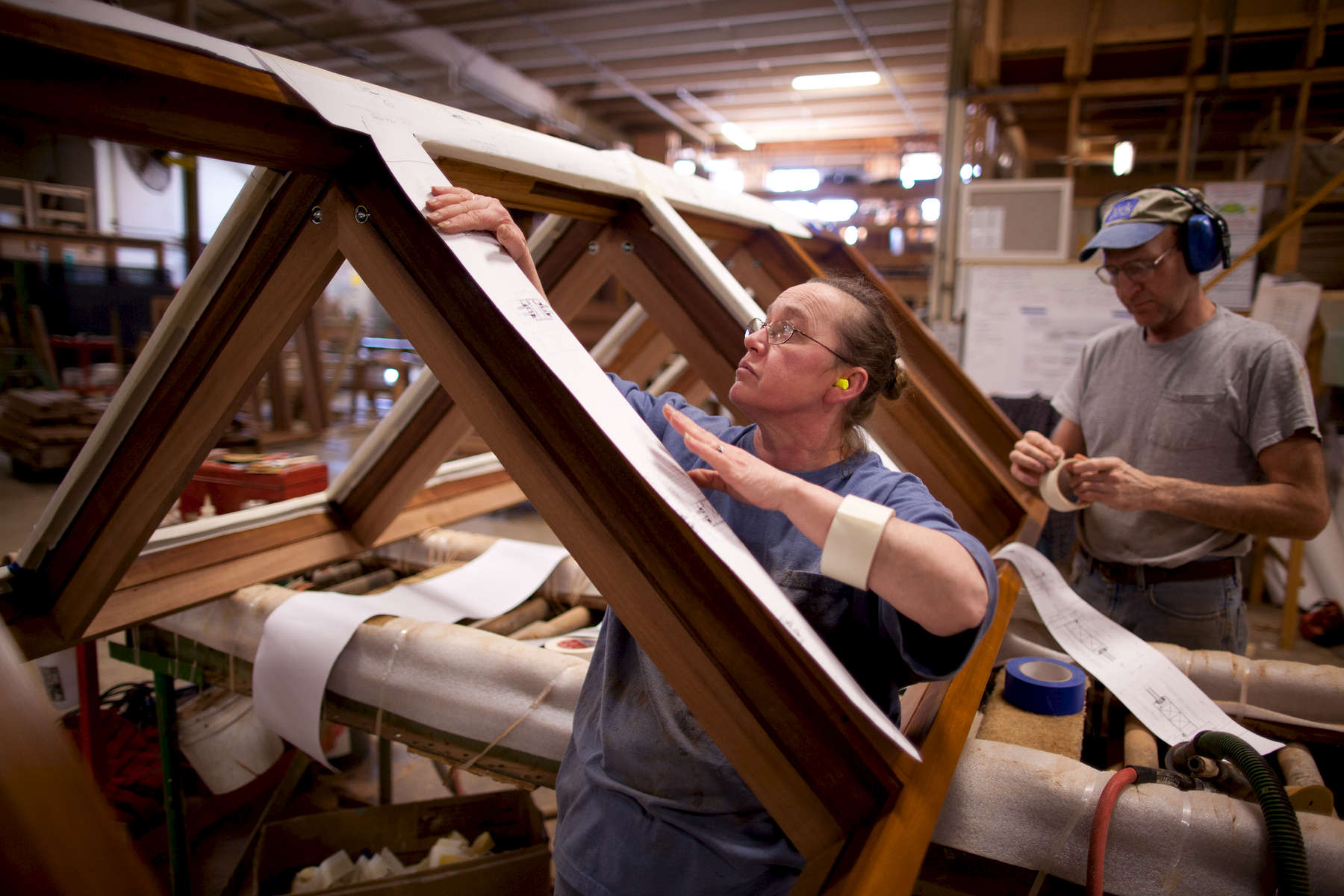 Workers at Duratherm Window Corporation in Vassalboro, ME. Duratherm is one of the leading makers of wooden architectural windows in the world.