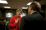 Salem, MA., October 13, 2011: Democratic Senate candidate Elizabeth Warren is on the campaign trail in Salem, MA talking to local business owners. Here she speakes with John Serafini, Jr. a local attorney. Photograph by Evan McGlinn for The New York Times.