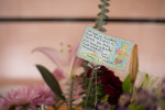 Note on a bouquet of flowers in the McCabe’s kitchen from their neighbors several days after three men were arrested. 