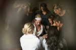 Valhalla wedding Lake Tahoe, bride praying with bridesmaids