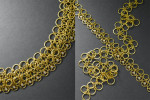 22 karat gold and diamonds samurai necklaces.