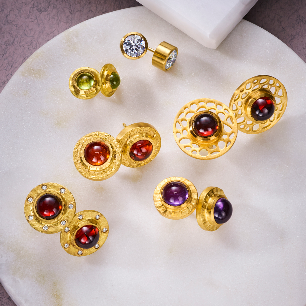 22 Karat gold, diamonds, colored stones. Available in platinum, in other sizes and other colors.