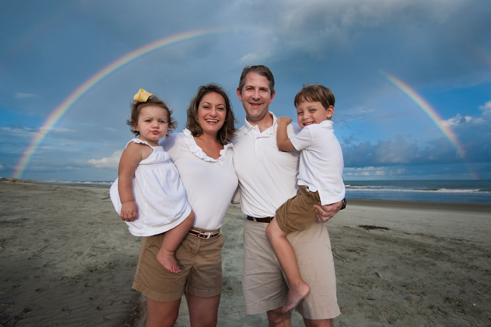 Rainbow stretches across the Isle of Palms for a beach photo session.