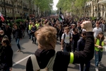 protestors kick tear gas shells back towards the police during International Labour Day as demonstrations turn violent on May 01, 2019 in Paris, France. May 1st and International Labour Day has given the Gilets Jaunes or ‘Yellow Vests’ the opportunity to mark Act 25 of protests, the first since November 17, 2018 not to take place on a Saturday.