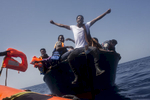A migrant reacts after being rescued by the Ngo organization' members of Proactiva open Arms. 