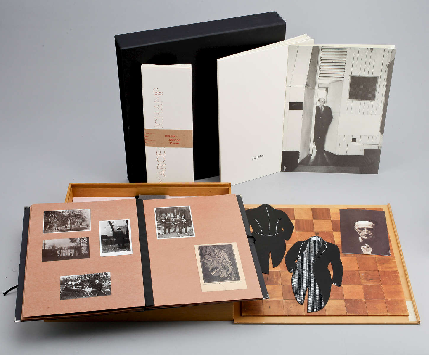 [Marcel Duchamp (1887 - 1968)]Wood box reproducing Marcel Duchamp's Mental Chess Board from 1937 and containing an exhibition catalogue (64 pp 13 3/8 x 4 1/4 in; 340 x 107 mm, complete with the price list); a portfolio containing reproductions and facsimiles of Marcel Duchamp's works, also including H. Vuibert, Les Anaglyphes Geometriques, Paris Librairie Vuibert, 112 (with 3D glasses); a book of articles on Duchamp by Andre Breton and Arturo Schwarz (inserted, on separate sheet, a reproduction of Le Grand Verre); an audiocassette of Duchamp speaking {quote}Priere d'ecouter{quote} with, on top of it, a miniature reproduction of Enrico Donati's breast from 1947; a single photograph of {quote}Marcel Duchamp at the Age of 85 for View; a colophon.14 1/2 x 14 1/4 x 2 1/4 in (37 x 36.5 x 6 cm)Numbered 417/850 on the inside coverEdited on the occasion of the exhibition {quote}Marcel Duchamp,{quote} Antwerp: Ronny Van de Velde, 1991Please click HERE for full fact sheet