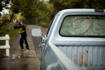 Near a creek in San Luis Obispo, Calif., on Sunday, November 20, 2011, teenage boys left their truck parked in the center of the dead end  road while they spent the afternoon playing in the rain. One of the boys  claimed a family member created the heart full of pennies on the back window.