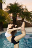 Jenna Pfaff, 16, from Colorado Springs, CO., is lyrical dancing in the kid pool area of her Aunt Debbie and Uncle Johns' house in Lake Forest, Calif., on Thursday, December 29, 2011 to continue the photographers' portrait series on Dancers in Water. Pfaff continues to compete in competitions and loves to tell stories through her movement. 