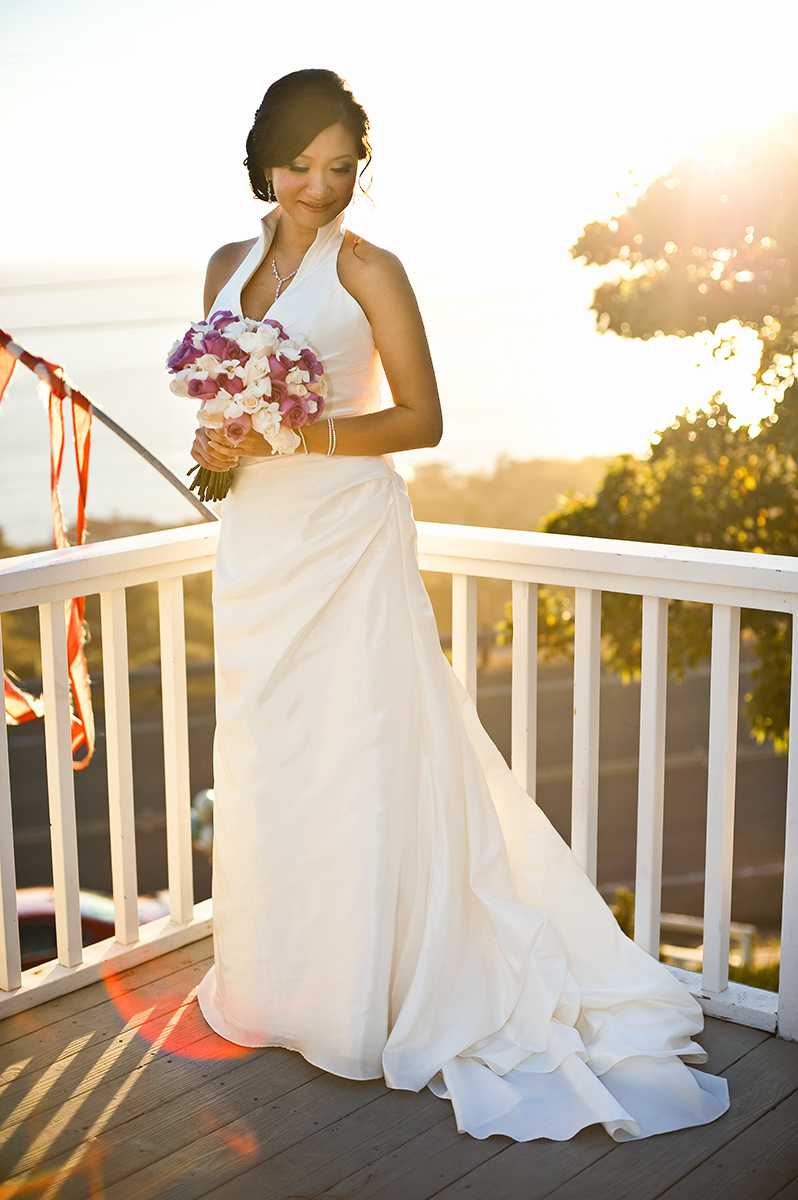 Bride, Eva Wu, 30, from El Monte, Calif., is grasping the last sun rays of her single life before walking down the aisle to her groom, Jeff Grant, 38, from Huntington Beach, Calif., at an ocean view home in Malibu, Calif., on Saturday, October 27, 2012. Wu's father came from China just to see his little girl get married. 