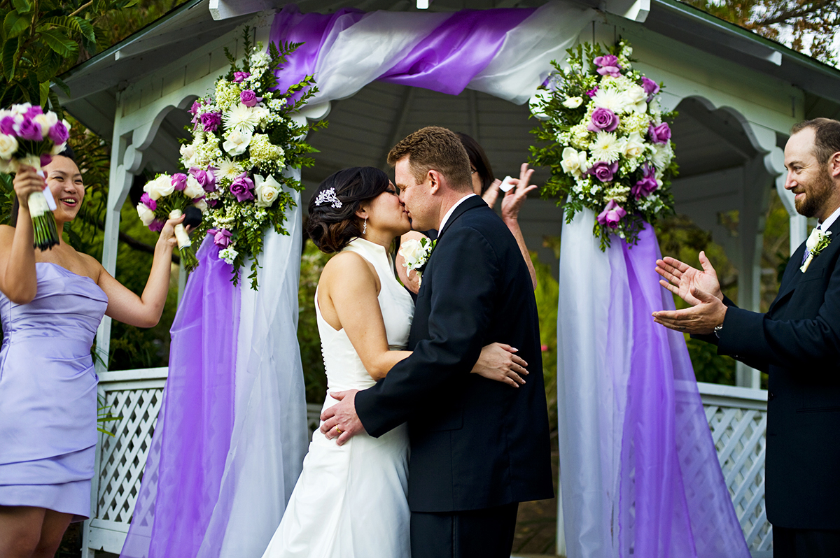 Groom, Jeff Grant, 38, from Huntington Beach, Calif., kisses his bride, Eva Wu, 30, from El Monte, Calif., to be husband and wife at an ocean view home in Malibu, Calif., on Saturday, October 27, 2012. The two were wed in front of the gazebo for an intimate ceremony with their close friends and family. Mr. Grant said, {quote}I love her personality,{quote} he continues, {quote}when we are together everything is easy, natural, and we have a good time.{quote} Mrs. Grant said, {quote}He makes me laugh all the time,{quote} she continues, {quote}He's sweet and spoils me all the time.{quote}