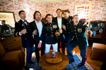 Duncan Carlton, 26, from Laguna Niguel, Calif., is with his groomsmen having scotch before the ceremony to be wed to his bride, Sarah Schultz, 28, from Laguna Niguel, Calif., at the Vesuvius Vineyard in Iron Station, North Carolina on Saturday, December 29, 2012. The wedding included customs such as a first look, sword arch entrance, cutting the cake with Carlton's sword, toasts, bouquet toss, tossing the garder, and lots of dancing. 