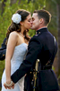 Bride, Sarah Ann Schultz, 28, from Laguna Niguel, Calif., and groom, Duncan Mark Carlton, 26, from Laguna Niguel, Calif., hold eachother tight as they share a passionate first kiss as husband and wife at the Vesuvius Vineyard in Iron Station, North Carolina on Saturday, December 29, 2012. Schultz choked up a bit during her wedding vows. 