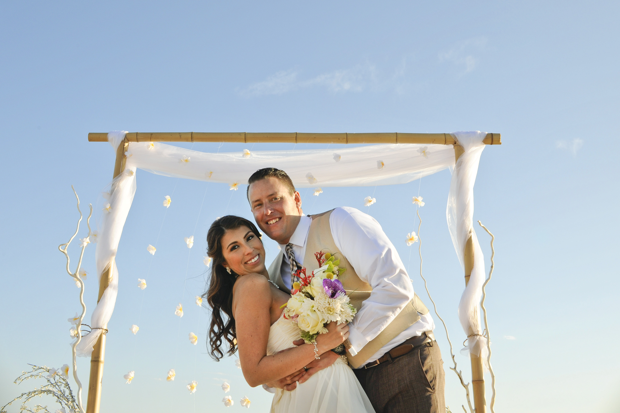 Groom, Russell Thomas, from Costa Mesa, Calif., marries Laura Palacios, from Costa Mesa, Calif., on the sands of Newport Beach, Calif., on May 1, 2015.  After their ceremony they danced all night on the Tiki Boat in the Newport Harbor under a full moon. 
