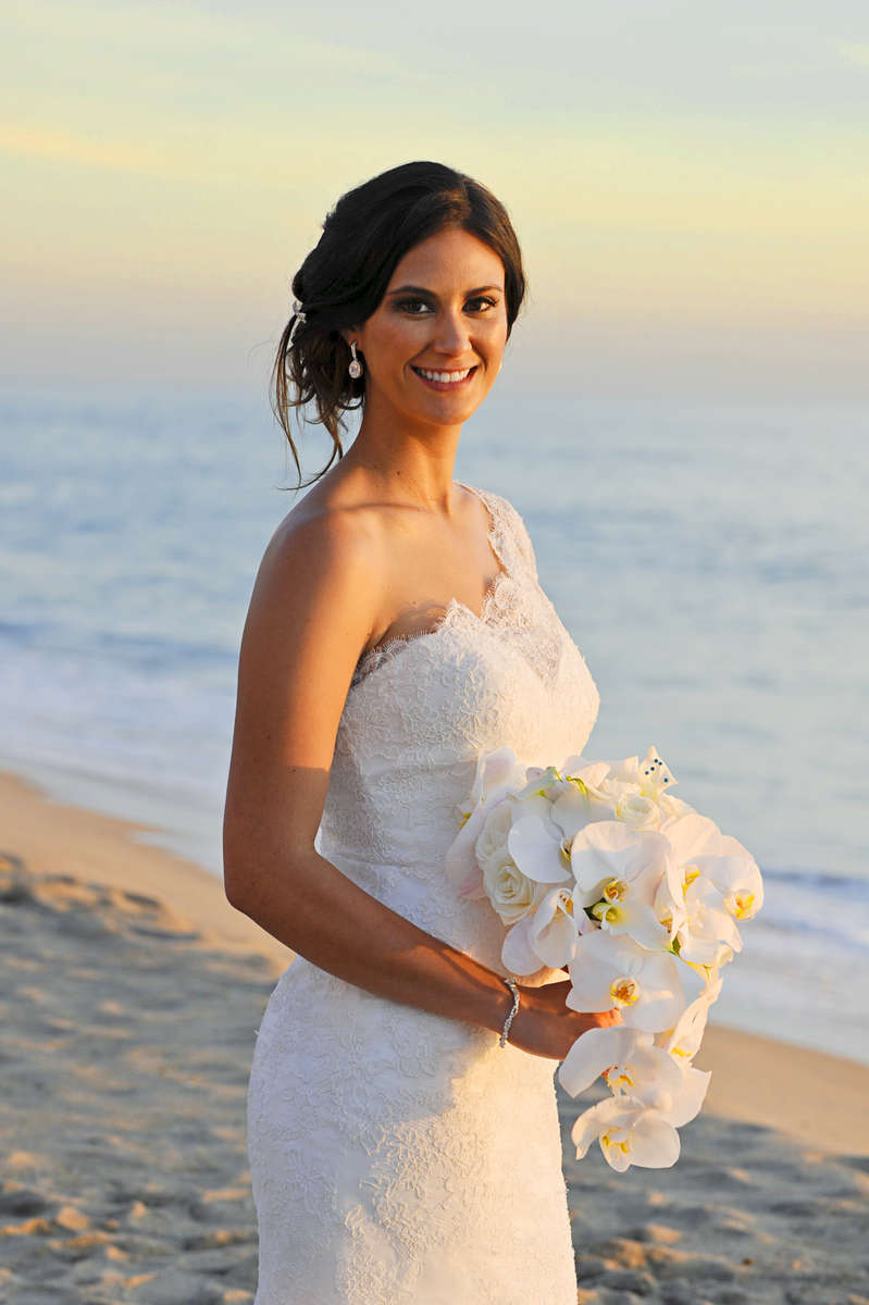 Christopher John Parese and Lindsay Michelle Lopez became husband and wife on a Southern California beach in Carlsbad, Calif., on Saturday, October 24, 2015 at the Beach Terrace Inn supported by their children, family, and friends. The bride and groom look forward to {quote}spending our lives together, raising our children, and making more happy memories.{quote} (Photo by: Meagan Reidinger © 2015)