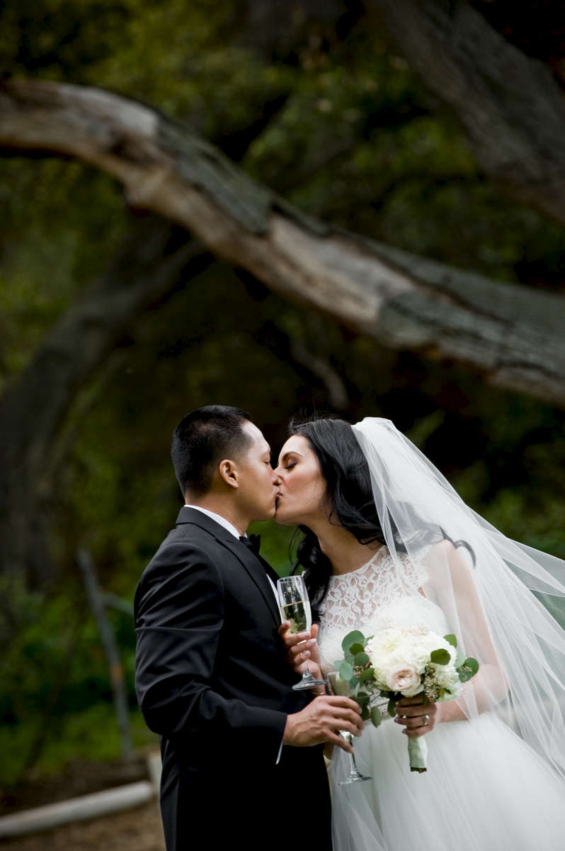 Francis Tangonan and Veronica Navarro from Buena Park, Calif., become husband and wife surrounded by their friends and family at the Temecula Creek Inn in Temecula, Calif. on Thursday, March 20, 2016.  Mr. and Mrs. Tangonan had the time of their life celebrating under the oak trees and could not to leave for their honeymoon to St. Lucia and New York the following day.  Congratulations.  (Photo by: Meagan Reidinger © 2016)