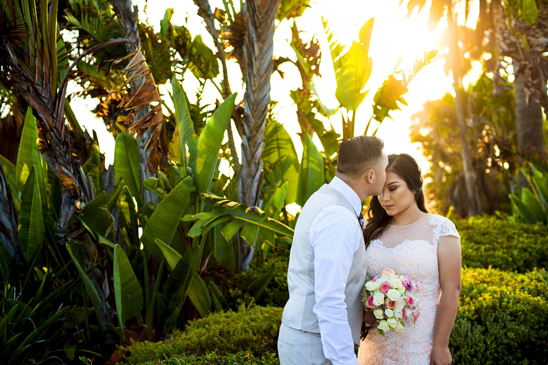 Rudy Avila, 27, and his bride, Yemeni Lopez, 25,from Rancho Cucamonga, Calif., were married at the Laguna Beach Gazebo in Laguna Beach, Calif., surrounded by their closest friends and family members on Saturday, August 20, 2016.  Avila and Lopez have been together for the past seven years after meeting at a mutual friends home and recently gave birth to their son, Jason Avila, 6 months.  The couple is excited to start their next chapter in life beginning with a large family reception equipped with tacos at their home.  (Photo by: Meagan Reidinger © 2016)