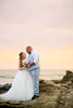 Claire Anderson marries her best friend Jose Menjivar overlooking the Pacific Ocean during sunset under the Laguna Beach Gazebo in Laguna Beach, California on Wednesday, August 15, 2018.  Their destination wedding was romantic with Claire's stunning Vera Wang gown, harp player, candles, sunset, their family visiting from England, and their three month old daughter, Ava. (Photo by: Meagan Reidinger © 2018)