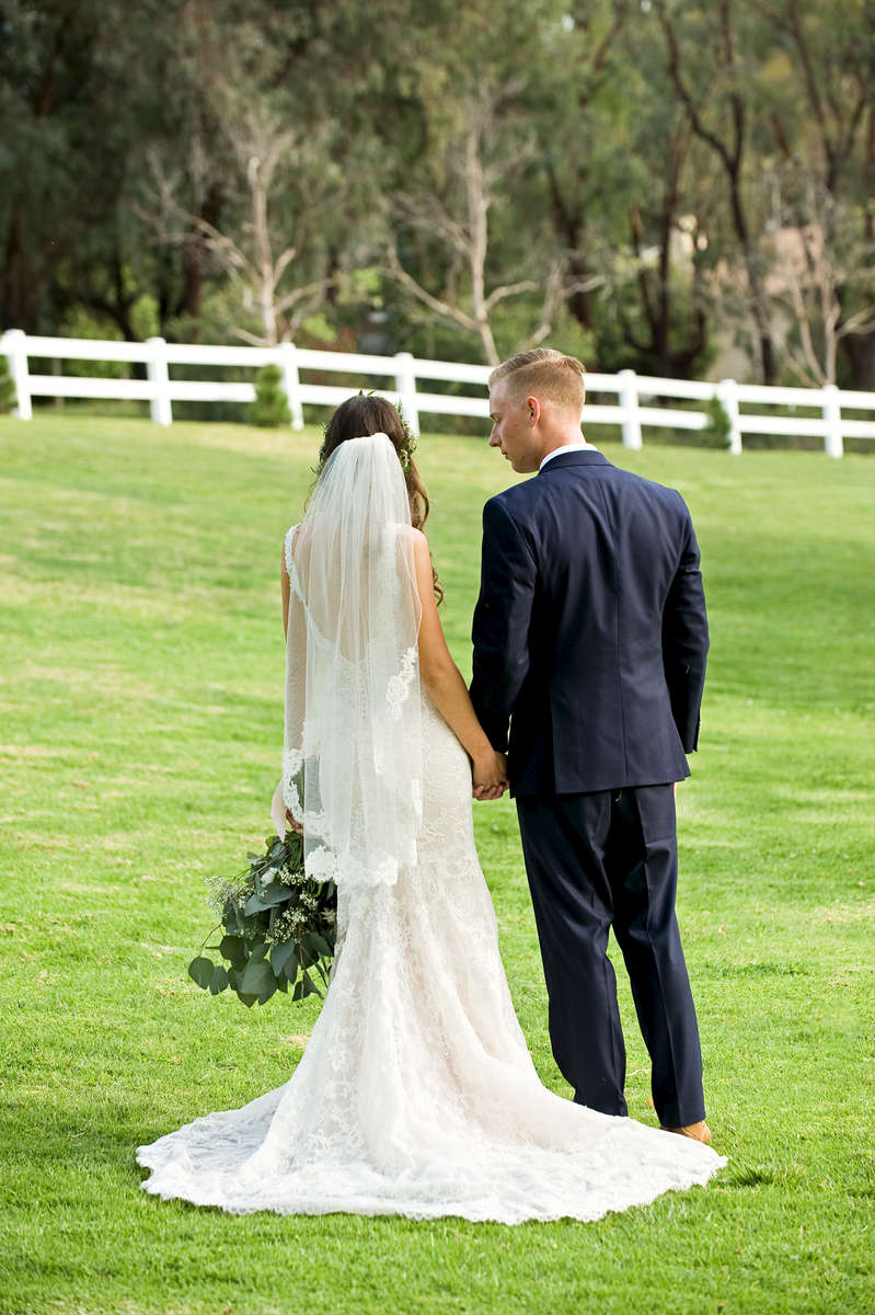 Registered Nurse and beautiful bride, Katy Faria, marries her elementary school sweetheart and firefighter, Chad Morrison, at Coto Valley Country Club in Coto De Caza, Calif., on Saturday, April 6, 2018.  The couple first and foremost follow Jesus Christ as their personal Savior and were ecstatic to celebrate their marriage with their closest friends and family.  The tear-filled vows, key to her heart necklace, first look, swing, and sparkler exit were a few of the cherished moments during the Morrison Wedding.(Photo by: Meagan Reidinger © 2018)
