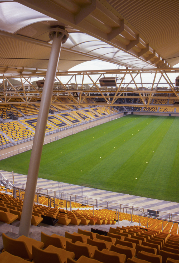 Parkstad Limburg Stadium in Kerkrade, the Netherlands, home of Roda JC, seen here with its first turf, also houses a hotel and a variety of shopping venues.