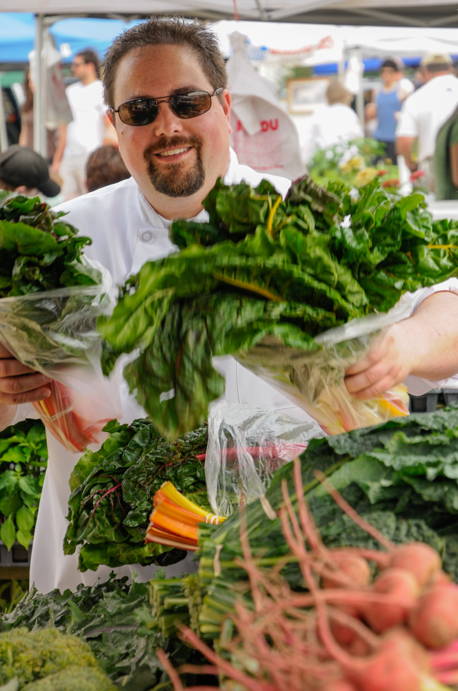 Adam Rose, Acclaimed Chef, Il Palio RestaurantAdam Rose, chef at Il Palio Restaurant in Chapel Hill, North Carolina, selects fresh greens at the Carrboro Farmers' Market.