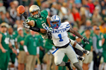 William and Mary's Trey Reed, left, disrupts a pass intended for Hampton University's Rayshad Riddick during Saturday's game at Zable Stadium October 24, 2015. 