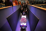 The casket of Donovon Lynch is escorted out of Wave Church following a celebration of life ceremony Monday April 5, 2021. Lynch was shot and killed by a Virginia Beach police officer Friday, March 26 at the Virginia Beach Oceanfront. 