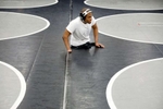 Landstown senior Adonis Lattimore practices with teammates as he prepares to wrestle in the Class 6 Region A championships and advance to the state tournament.Adonis was born without a right leg and with a partial left leg. His right hand has only one finger.“When you say you can’t,” Adonis' father, Jerrold, said, “he’s the reason why you can.”