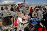 Tech Sgt. Grant Kiekhaefer kisses his two-year-old daughter Kori Kiekhaefer during a homecoming ceremony at Langley Air Force Base Tuesday afternoon October 9, 2018. One hundred eighty-seven members of the 1st Fighter Wing returned home after a six month deployment in the Middle East. 