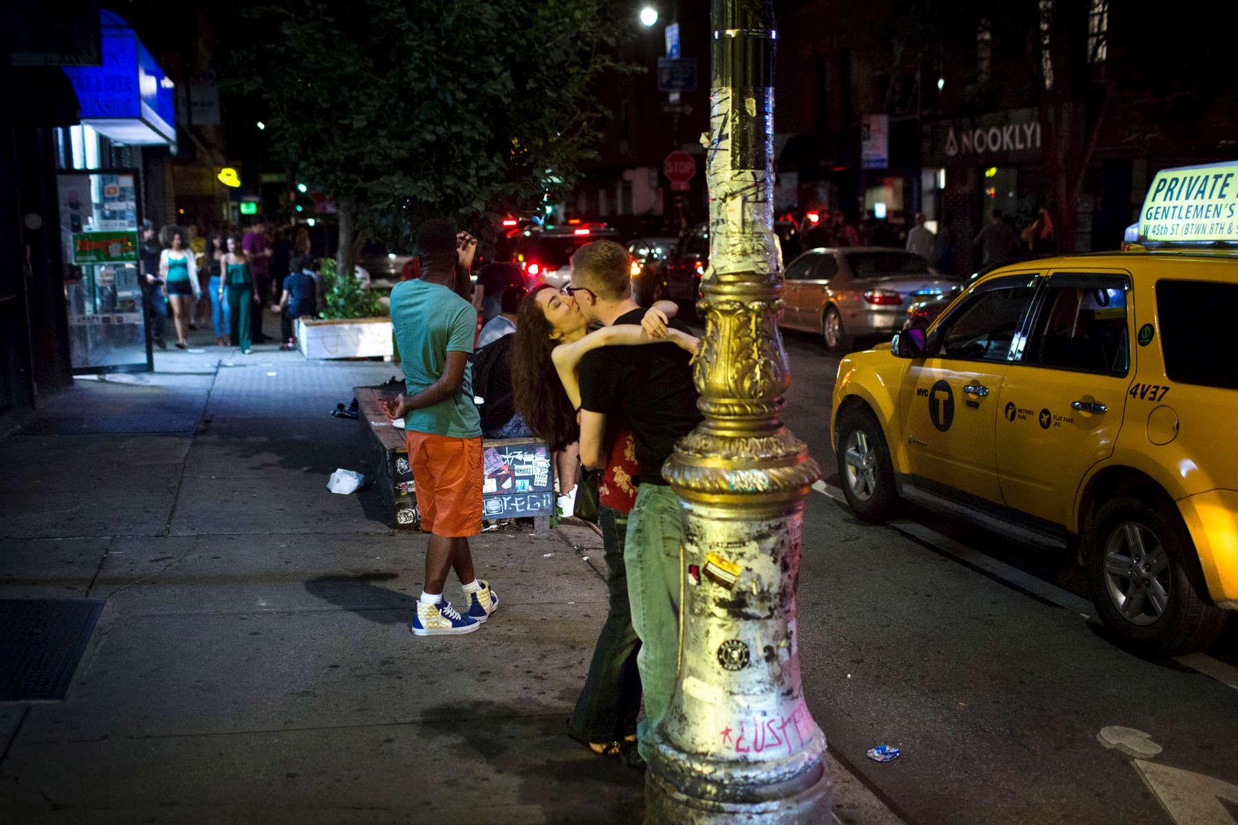 Manhattan, NY - July 29, 2018: Revelers embrace Stanton St. in the Lower East Side bar district in Manhattan, NY. Community groups are questioning the New York State Liquor Authority's practice of granting licenses in neighborhoods already saturated with bars and clubs.CREDIT: Kevin Hagen for The New York Times