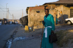 Savious Moyo, 43, a member of The Nations 12 Apostles Nazareth Zion Church, stopped to pose for a photographer. 