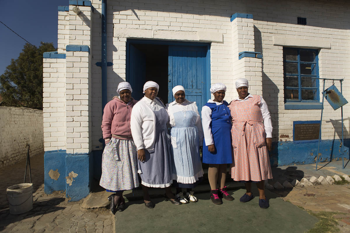 These women are a part of the congregation at St. John Apostolic Faith Mission Church.They are from left to right: Annah Tjale, 49, Elizabeth, Phetsheni, 33, Mitta Mabena, 54, Boitumelo Pila, 12 and her mother Ntsoaki Pila, 27. 
