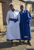 Sonelai Gakane, Sinazo Makunge, both 18 years old, were dancing in the street just before this photo was taken. They were still enthralled in the fervor of the church service they had attended.