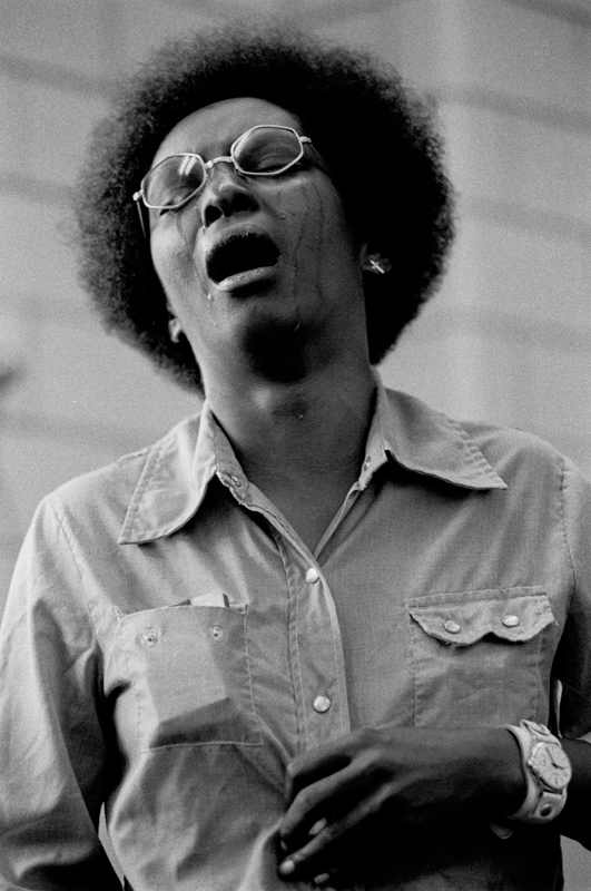 Chicago - Circa June 1974 - A former heroin addict sings a gospel at a methodone clinic during a group therapy session.