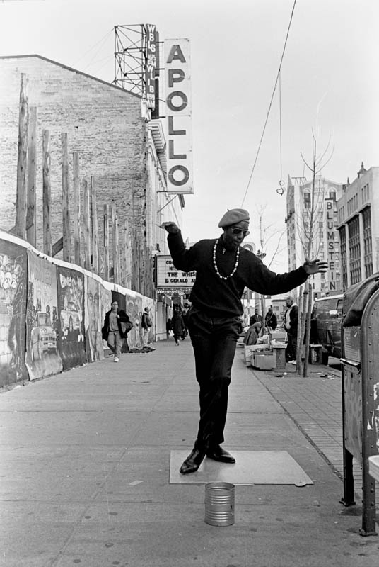 May, 1993 - This fellow calls himself {quote}Dancing Harry.{quote} He can usually be found near the world famous Apollo Theater making his moves on a slick board to the sounds of Soul Brother #1 James Brown.