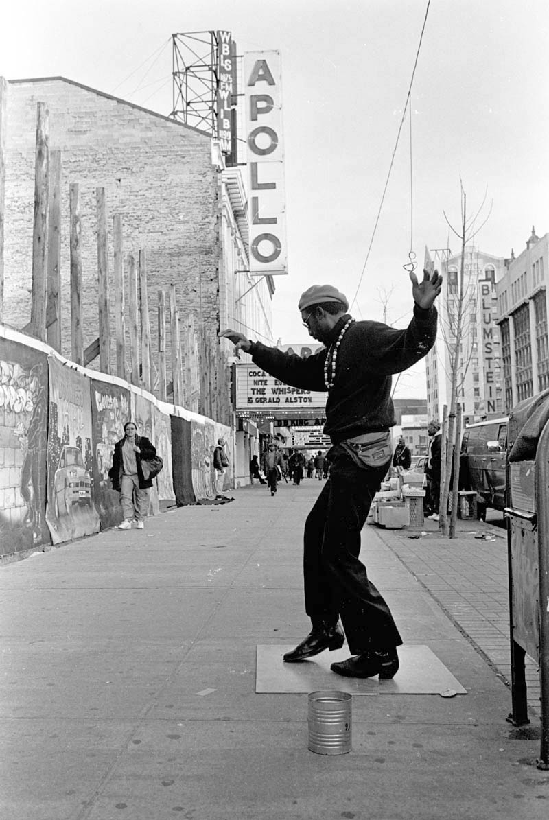 May, 1993 - This fellow calls himself {quote}Dancing Harry.{quote} He can usually be found near the world famous Apollo Theater making his moves on a slick board to the sounds of Soul Brother #1 James Brown.