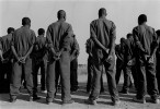 These black soliders line up at a training facility for the SADF. Photo by Ozier Muhammad/The New York Times