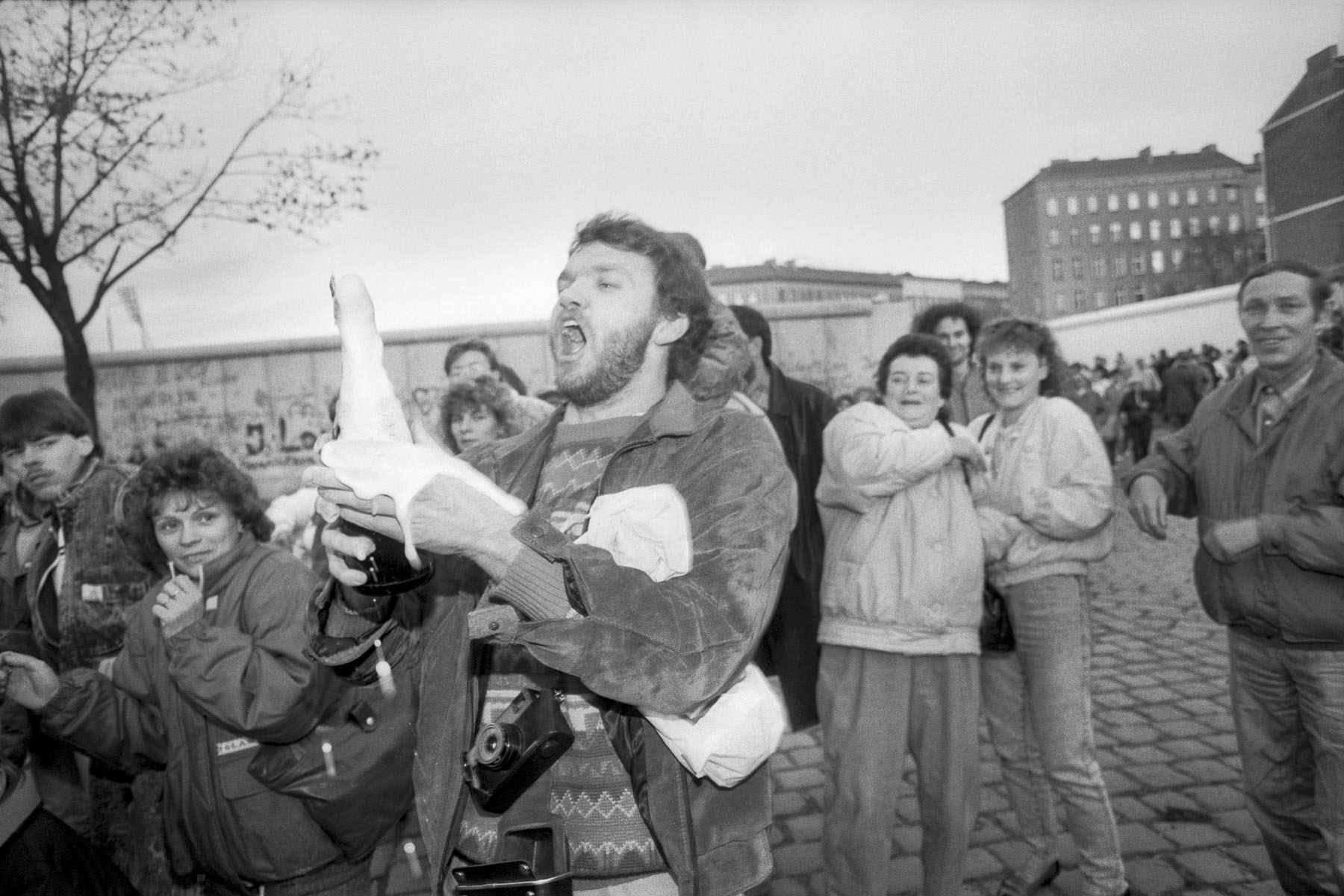 East Berliners reunited with their family in after the fall of the Berlin Wall on November 11, 1989