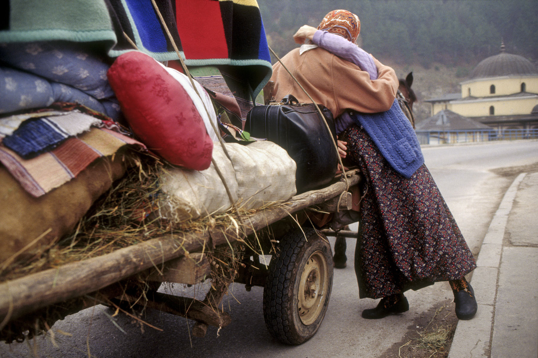 Bosnian refugees after the capture of their village by the Serb militiamen in November 1992