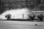 Anti-government demonstrators clash with police during plebiscite campaign vote in September 1988