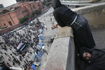 Anti-President Mubarak's demonstrators rest after a night of fights on Tahrir Square on Thursday February 3 2011