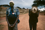 «Doctors Without Borders» employees during a storm in the Burundese Hutu refugee camp of Kanage in February 1994