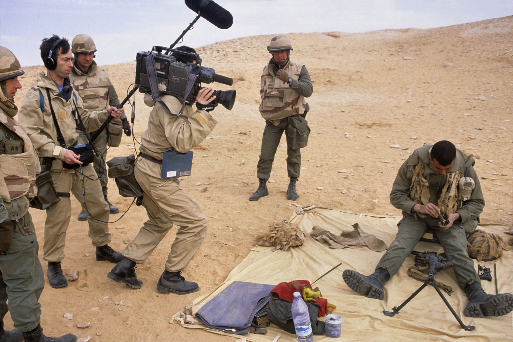 A French TV crew films a French Foreign Legion soldier in January 1991