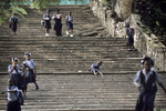 Pupils climbing down the stairs of the Sans-Souci palace built in 1806 by King Christophe and destroyed by the 1842 earthquake in October 2003