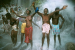On the day of the celebration of Our Lady of Mount Carmel, believers take a « luck bath » under the waterfall where Erzulie, the loa (voodoo spirit) of femininity, lives in July 1994