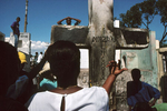 On All Saints’ Day, the Guédés celebration. The voodoo followers gather in the cemeteries around the Cross of Baron Samedi, loa (spirit) of the dead in November 1995