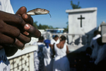 On All Saints’ Day, the Guedes celebration. The voodoo followers gather in the cemeteries around the Cross of Baron Samedi, loa (spirit) of the dead in November 1995