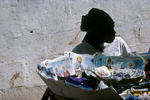 A seller of holy pictures in front of the Dezermit church next to Pétion-Ville. The loas (voodoo spirit) and the catholic saints in November 1996