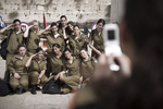 Israeli female soldiers pose in front of Western Wall. March 2008