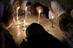 Russian Orthodox women pray in the Holy Sepulchre on Easter Day in April 2009